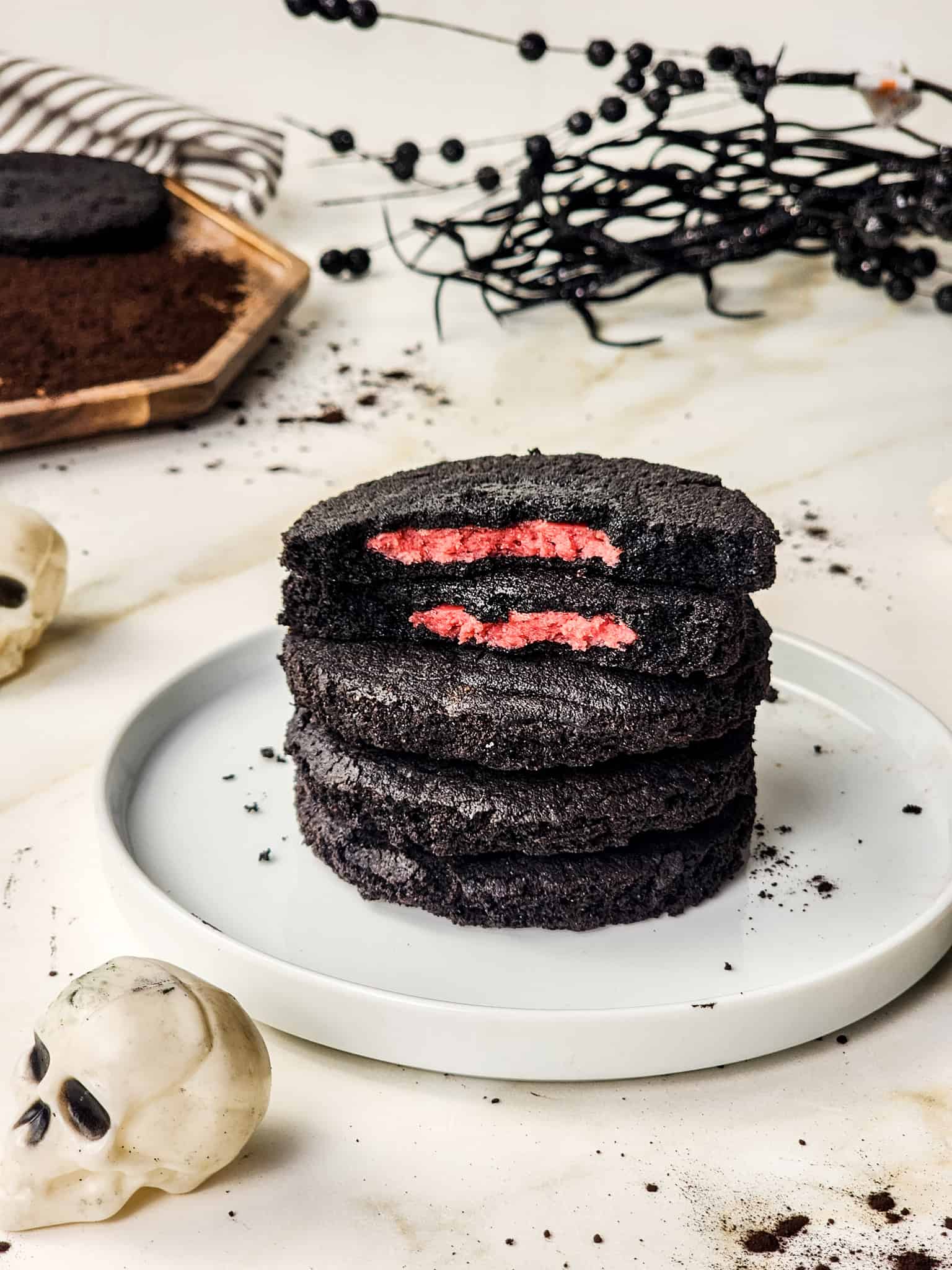 Rich and decadent black velvet cookies filled with raspberry cheesecake and rolled in cocoa sugar &ndash; the ultimate stuffed cookie recipe.